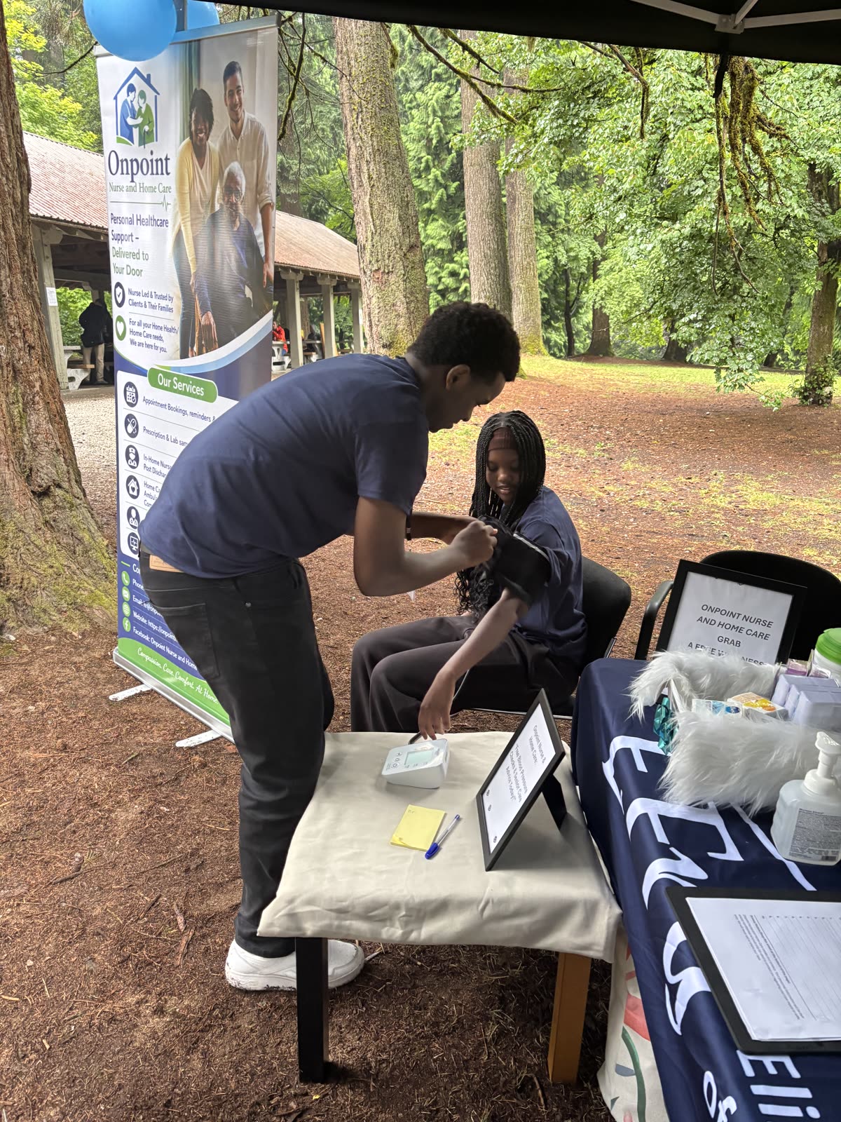 Clinical care team conducting thorough patient intake and vitals assessment